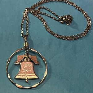 Vintage sterling silver half dollar liberty bell cut out pendant necklace